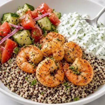 Grilled shrimp bowl with quinoa, cucumber and tomato